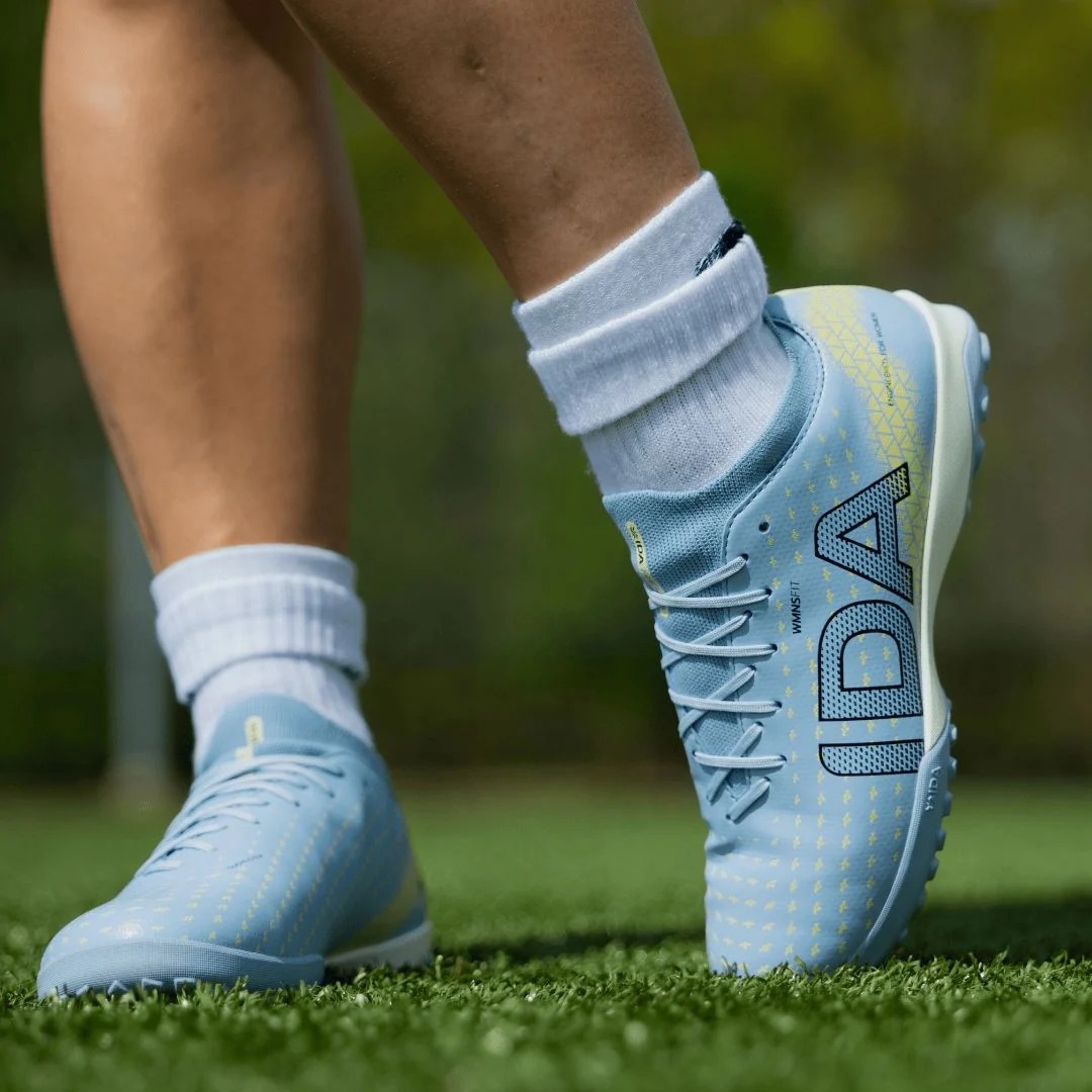 IDA Helia Club Turf Light Blue / Light Yellow soccer shoes, lifestyle view